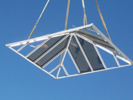 Bay Plaza skylight being hoisted up.